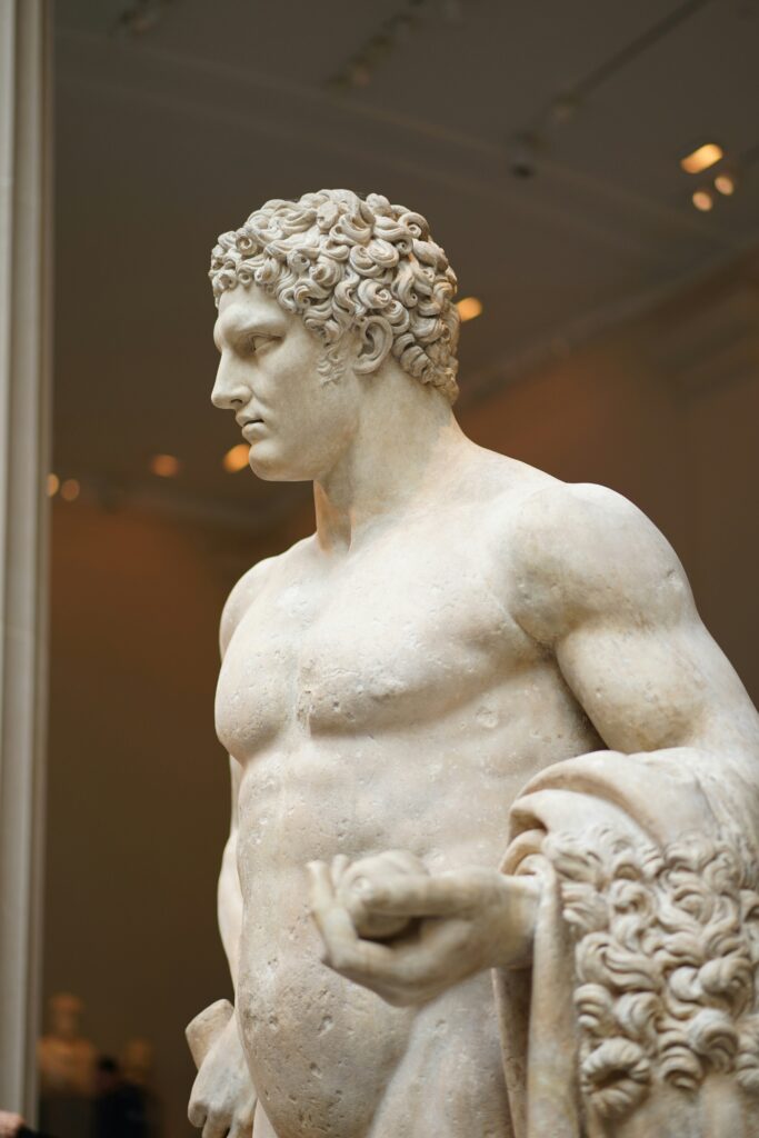 Roman marble statue to highlight how Roma redibit presents views through a roman lens.